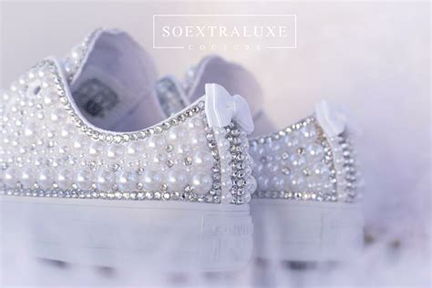 white rhinestone tennis shoes.